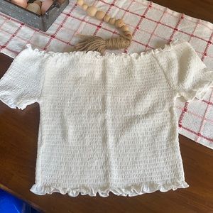 White smocked off shoulder top